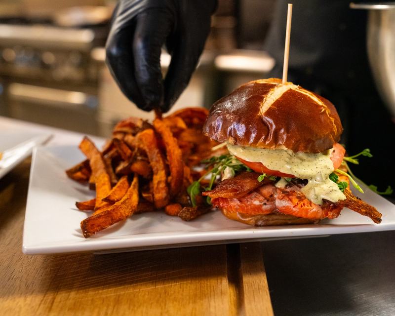 Nashville hot chicken sandwich with sweet potato fries